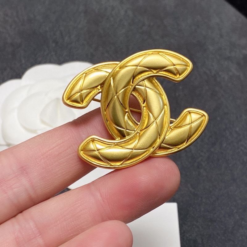 Ch**el brooches